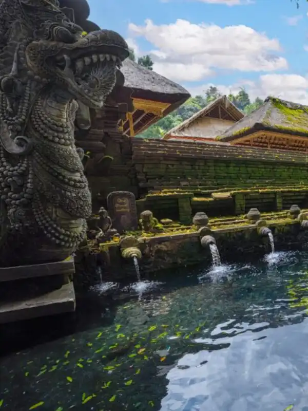 Tirta Empul Temple Bali - sacred water temple for traditional purification ritual, spiritual experience in Tampaksiring near Ubud, holy spring water attraction, Hindu cultural heritage site in Bali, must-visit temple during Ubud day tour, cultural and spiritual journey in Bali